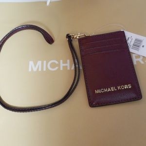 NWT!! Michael Kors Plum Leather Lanyard!